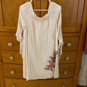 Adorable Potter’s Pot dress! Yellow soft stripes with flower design on front.